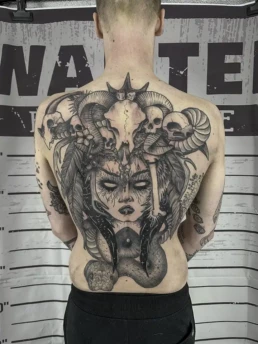 medusa skulls slang backpiece black and gray tattoo